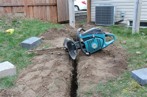 portable mini digger|hand held trench digger.